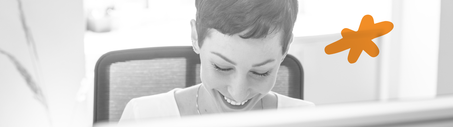 helen-smiling-at-desk